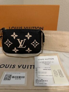Louis Vuitton Black with Cream Monogram Mini Pochette Wristlet
